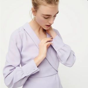 Purple peplum wrap blouse